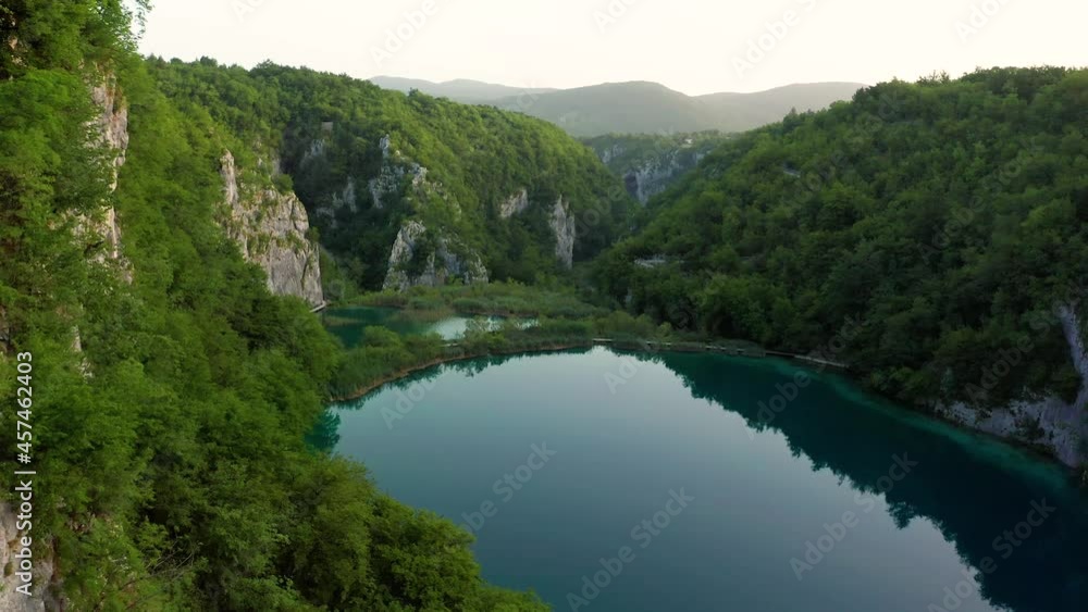 Plitvice, Croatia - 4K flying over at the beautiful lakes and waterfalls of Plitvice Lakes in Plitvice National Park on a bright summer morning Plitvice, Croatia - 4K flying over at the beautiful lakes and waterfalls of Plitvice Lakes in Plitvice National Park on a bright summer morning