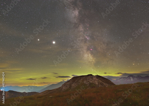 Milky Way over Alps with Jupiter  Saturn and magenta nebulaes