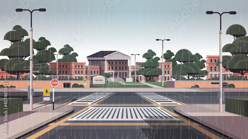 school building empty front yard with road crosswalk cityscape