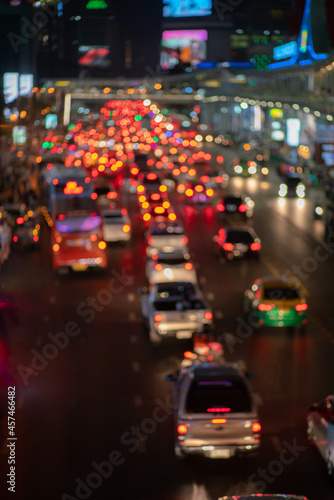 Abstract bokeh blurred in downtown city road with car tonned image