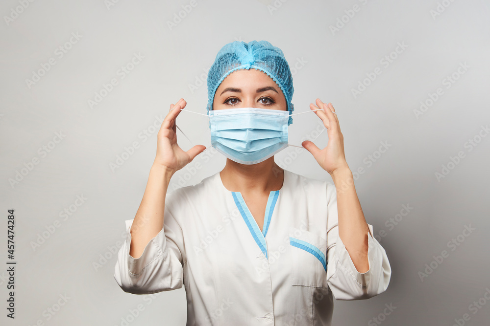 Doctor wearing medical mask, close-up portrait Doctor wearing medical mask, close-up portrait
