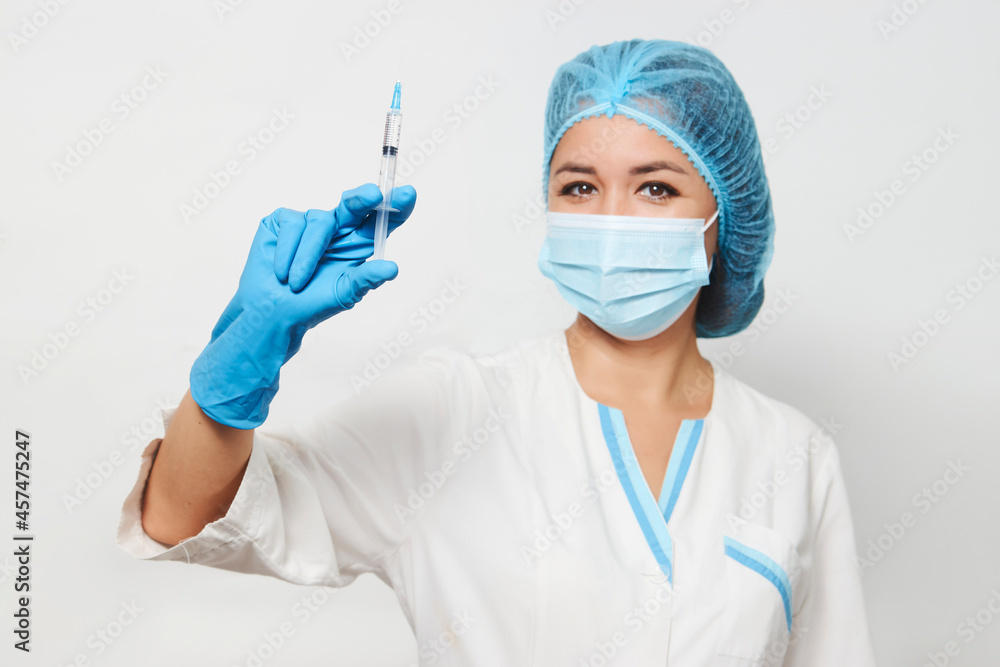 Female doctor injecting injection vaccine, close-up Female doctor injecting injection vaccine, close-up