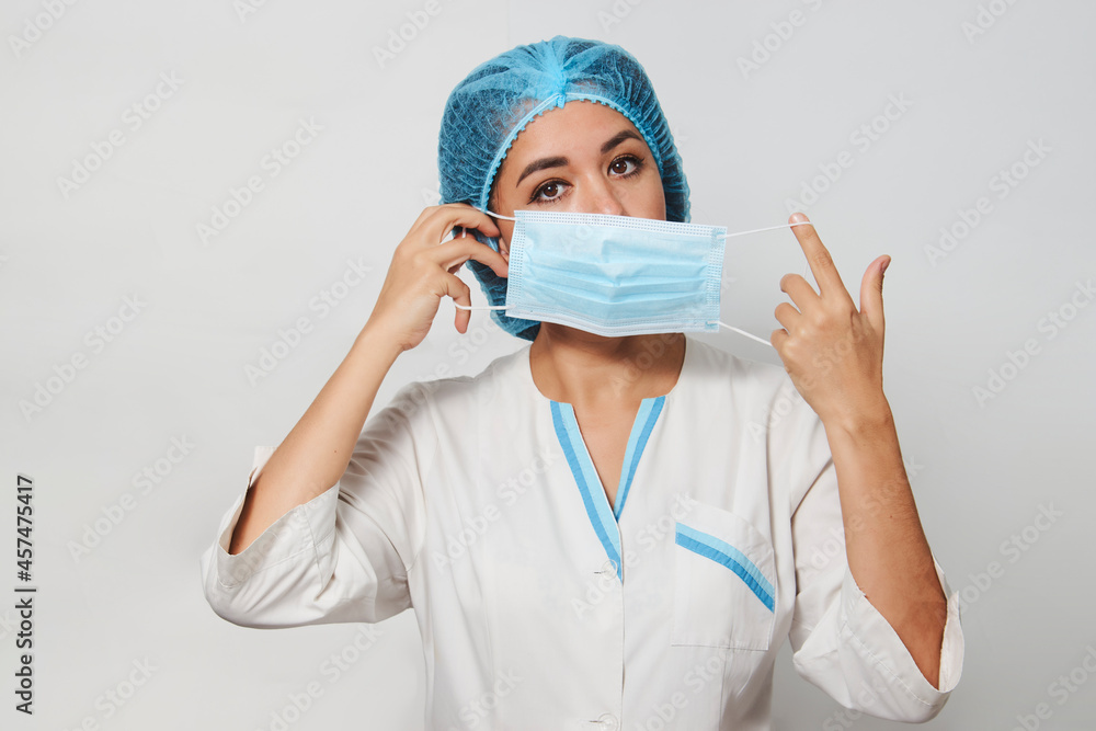 Doctor wearing medical mask, close-up portrait