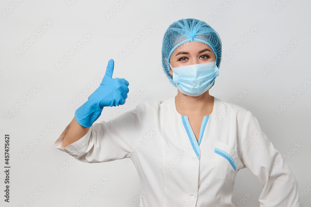 Doctor hand giving thumbs up, on white background