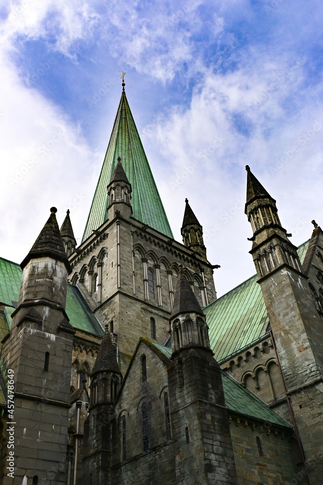 Nidaros cathedral in Trondheim with dramatic sky 