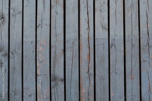 Wooden planks arranged in a vertical way to use as background