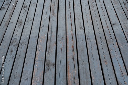closeup of old wooden floor in a park
