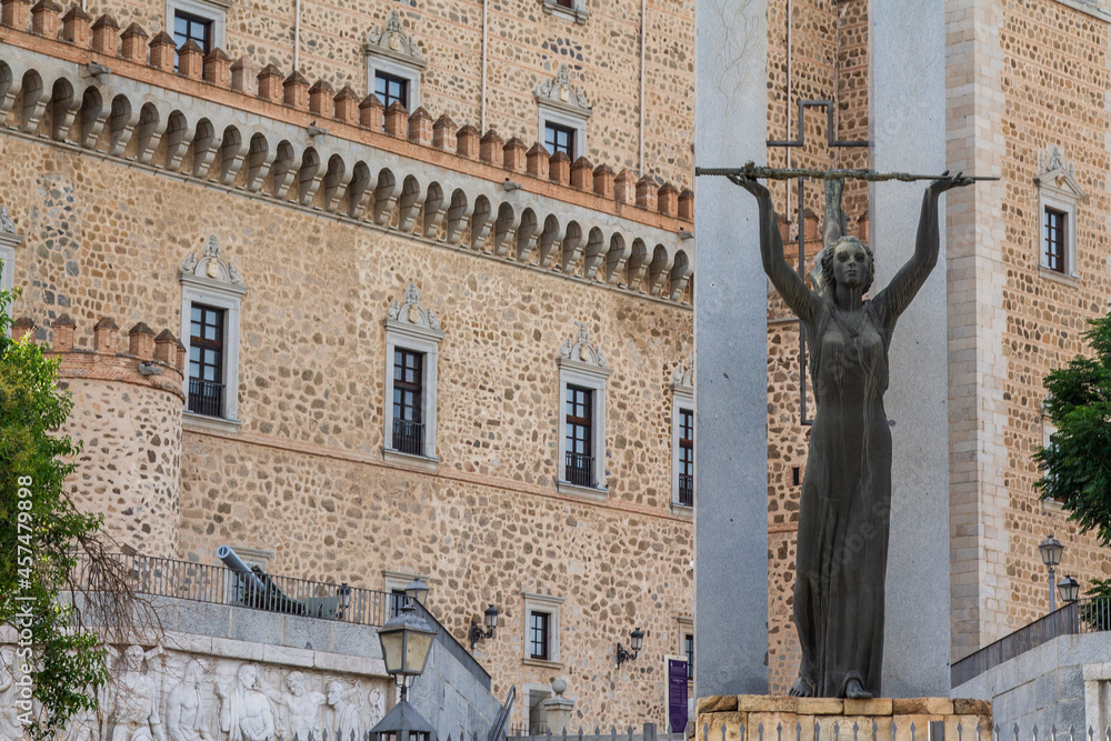alcazar de toledo historical monument of the city with the statue of a woman with a spear representing victory