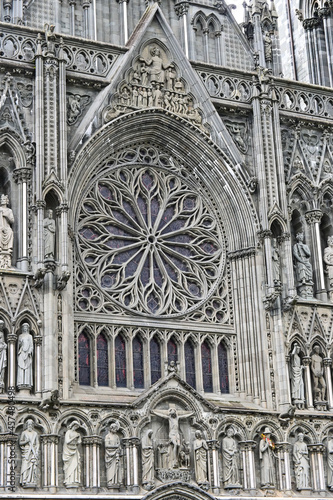 Detail Gothic roman catholic Nidaros cathedral in Trondheim with statues on the facade