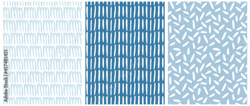 Wallpaper Mural Simple Abstract Seamless Vector Patterns with White Irregular Brush Spots and Lines on a White and Blue Background. Infantile Style Geometric Print. Abstract Doodle Pattern. Scribbles Print. Torontodigital.ca