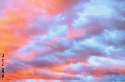 Colorful vibrant sky during sunset. Romantic sunset sky as natural background. The background of beautiful sky, colorful of sky. Abstract background