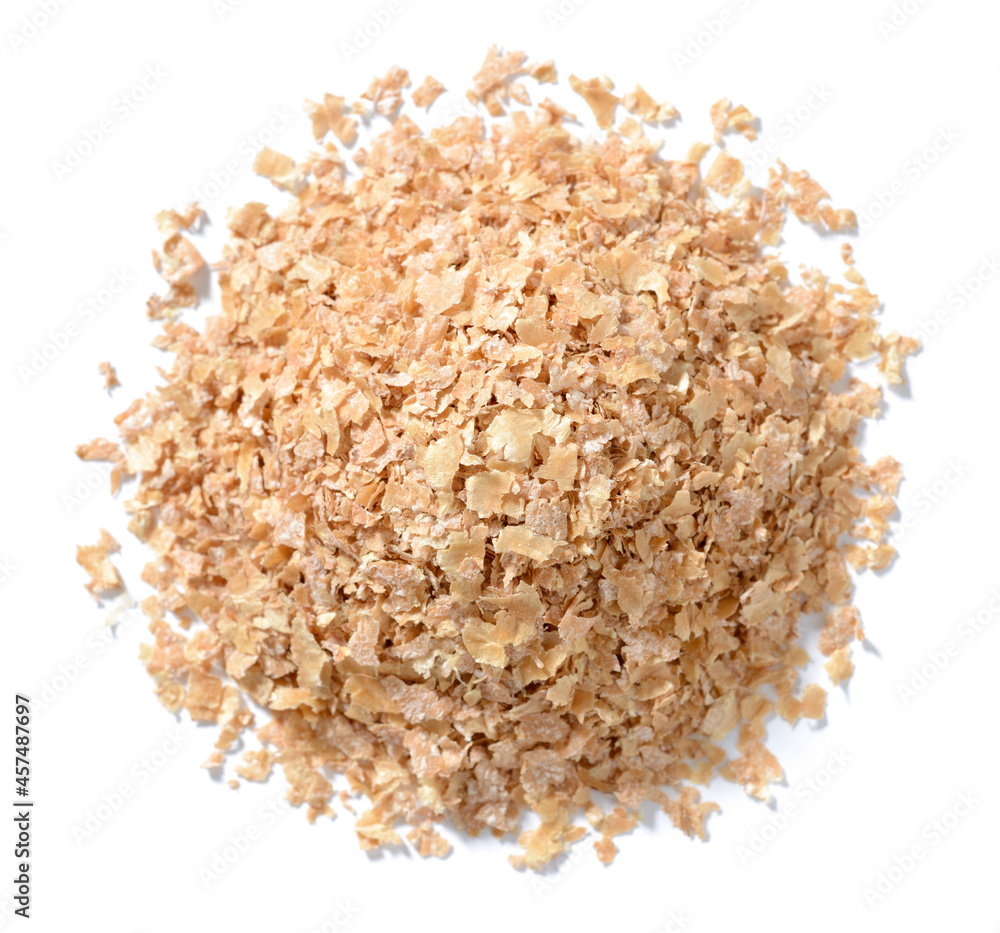 uncooked wheat bran isolated on the white background, top view uncooked wheat bran isolated on the white background, top view
