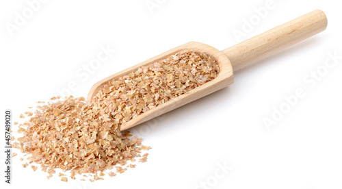 Slika na platnu raw wheat bran in the wooden scoop, isolated on white