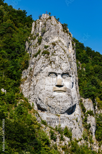 The statue of Decebal Rex at the Danube River in Romania photo