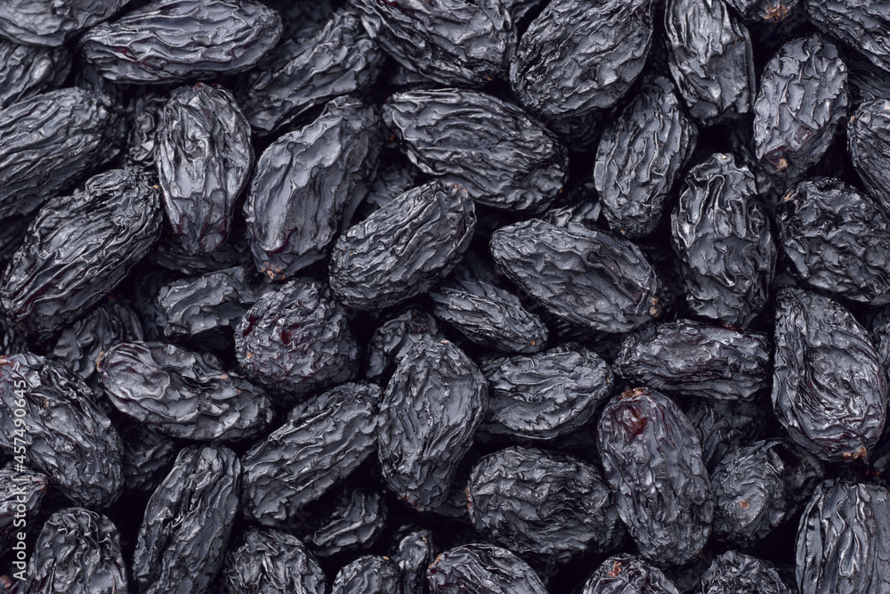 food backgrounds of black raisins, top view food backgrounds of black raisins, top view