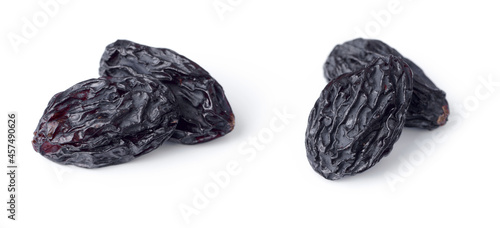 black raisins isolated on the white background