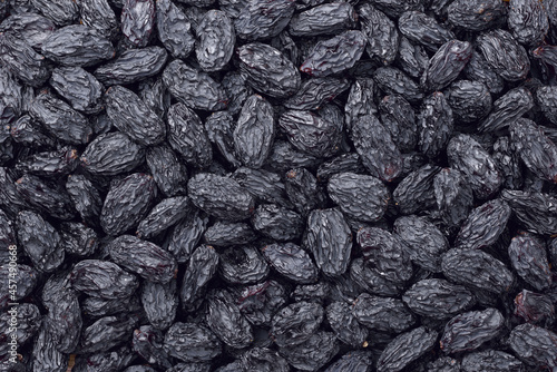 food backgrounds of black raisins, top view