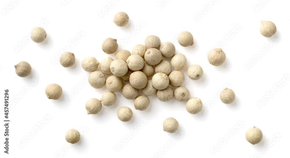 closeup of whole white peppercorns isolated on the white background, top view closeup of whole white peppercorns isolated on the white background, top view