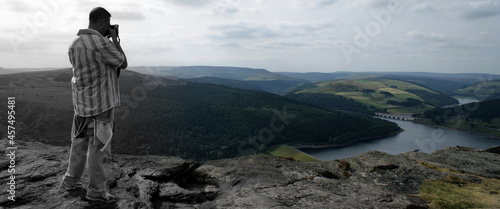Wallpaper Mural photographer taking photo on Bamford edge, looking out over the Ladybower Reservoir, Derwent Valley in Derbyshire, England Torontodigital.ca