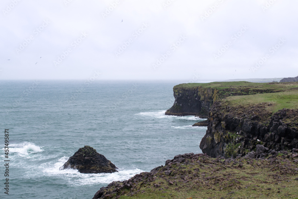 View of the fjords coastline at Snaefellsnes Peninsula, Iceland. Cloudy day during summer View of the fjords coastline at Snaefellsnes Peninsula, Iceland. Cloudy day during summer