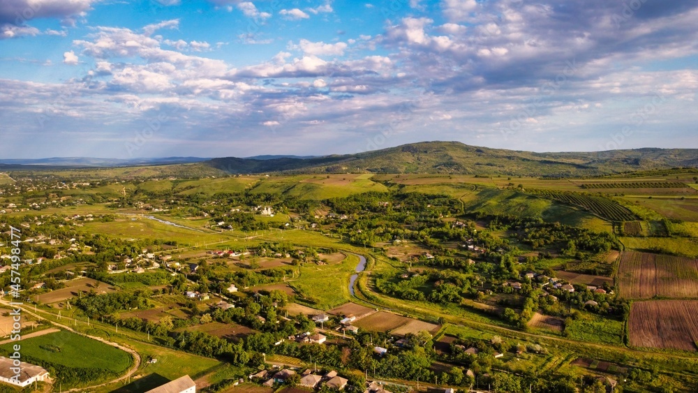 Aerial drone view of a village in Moldova at sunset