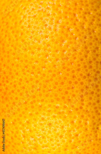 Wallpaper Mural Close up photo of Grapefruit peel texture. Exotic ripe fruit, orange background, macro view. Human skin problem concept, acne and cellulite. Beautiful nature wallpaper. Torontodigital.ca