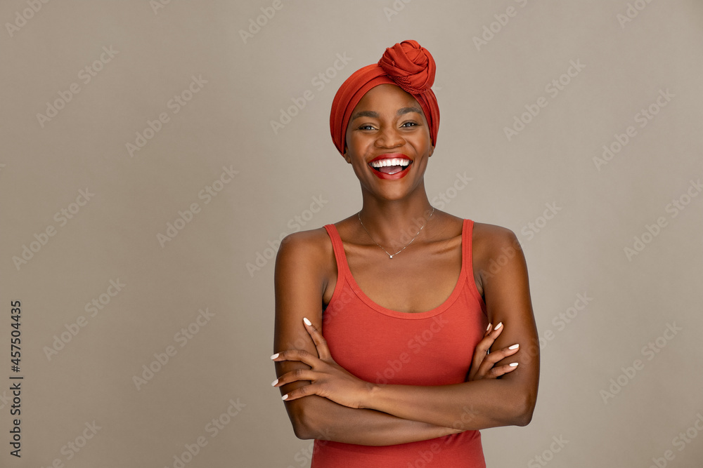 Beautiful african woman with headscarf laughing - obrazy, fototapety, plakaty 