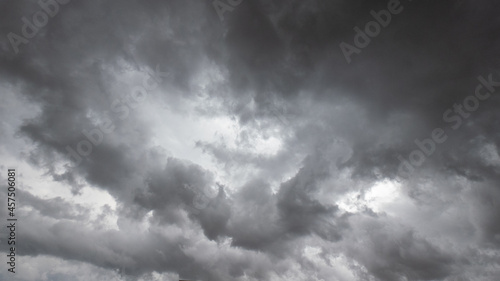 sky with storm clouds with backlights