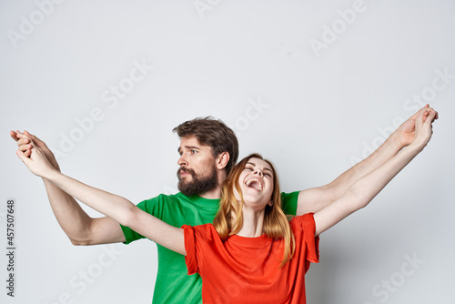 married couple multicolored t-shirts communication quarrel isolated background