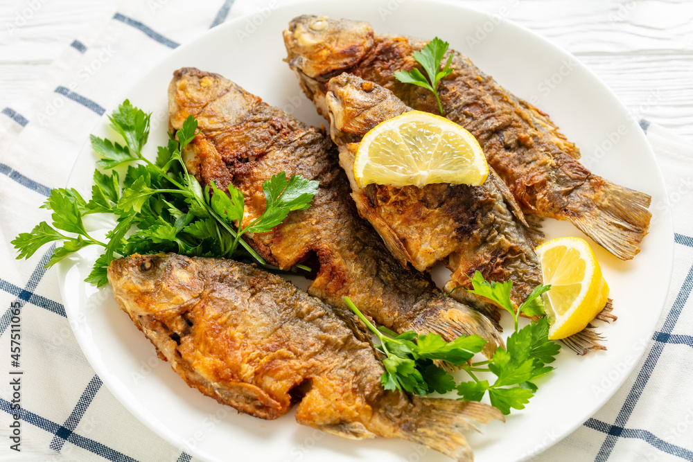 fried crucian carps with golden crispy crust fried crucian carps with golden crispy crust