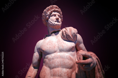 Fototapeta Naklejka Na Ścianę i Meble -  Roman statue of Emperor Hadrian with a bare torso. Marble. Perge. 2nd century AD. Antalya Turkey