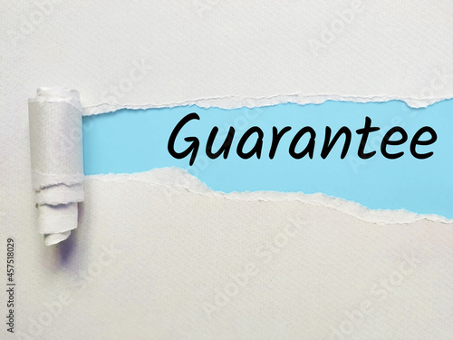 guarantee letters on ripped paper