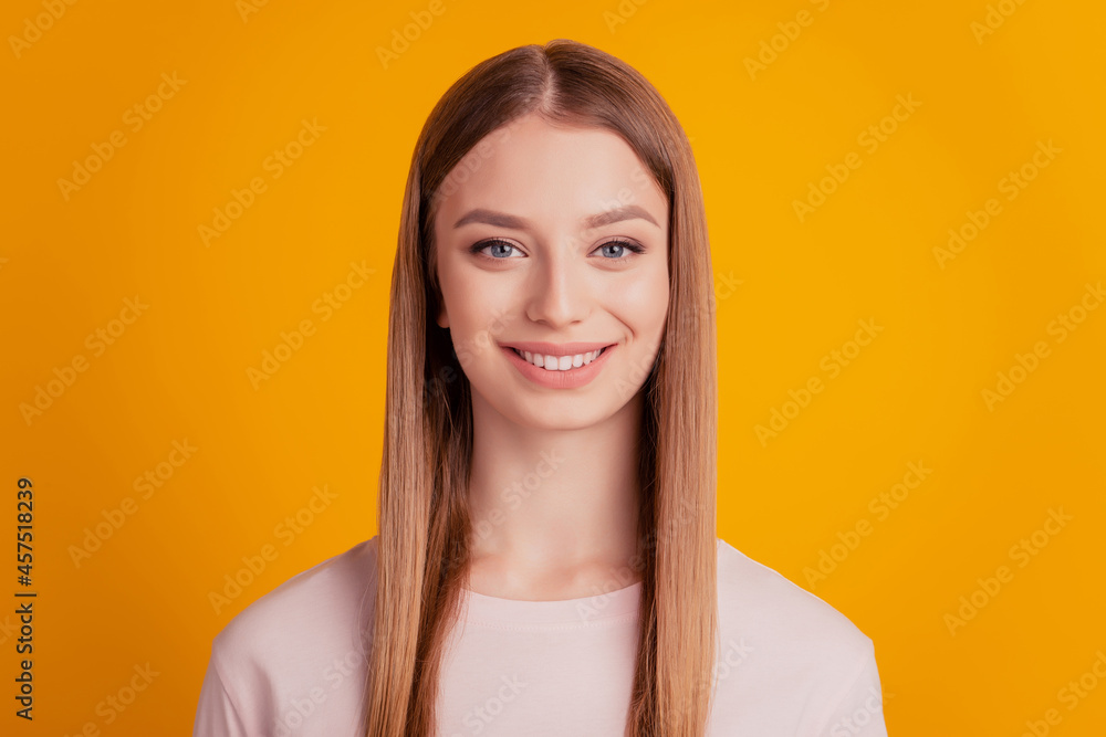 Portrait of lovely sweet cheerful lady look camera shiny white smile on yellow background Portrait of lovely sweet cheerful lady look camera shiny white smile on yellow background