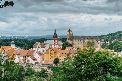 Panoramic view of famous medieval town of Loket,Elbogen, with colorful houses and stone castle above river,Czech Republic.Historical city centre is national monument.Travel architecture background © Eva