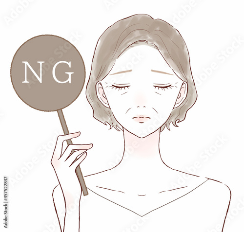 NGサインを出す中年女性