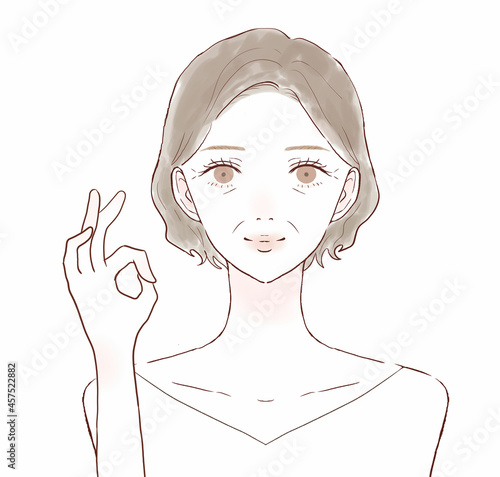 OKサインを出す中年女性