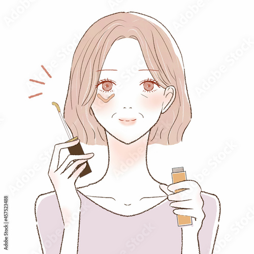 コンシーラーを目の下に塗り、クマを隠す中年女性