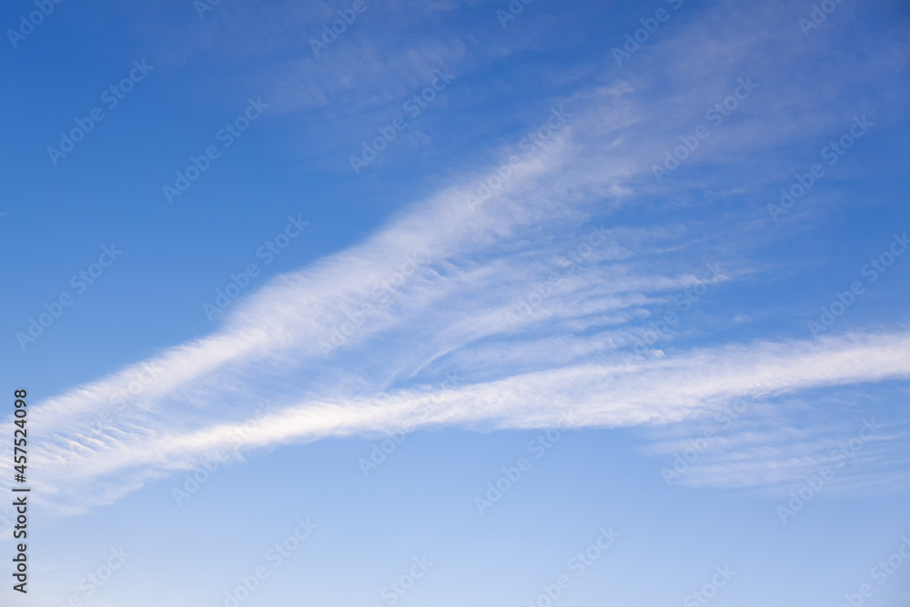 Vapor trails are line if clouds produced by aircraft . Contrails on the blue sky 