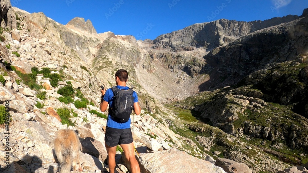 young man hiking in the mountains