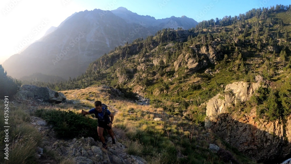 young man hiking in the mountains