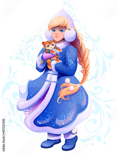 Snow Maiden Snegurochka granddaughter of russian santa claus hold small tiger in her hands symbol of 2022 year to chinese calendar