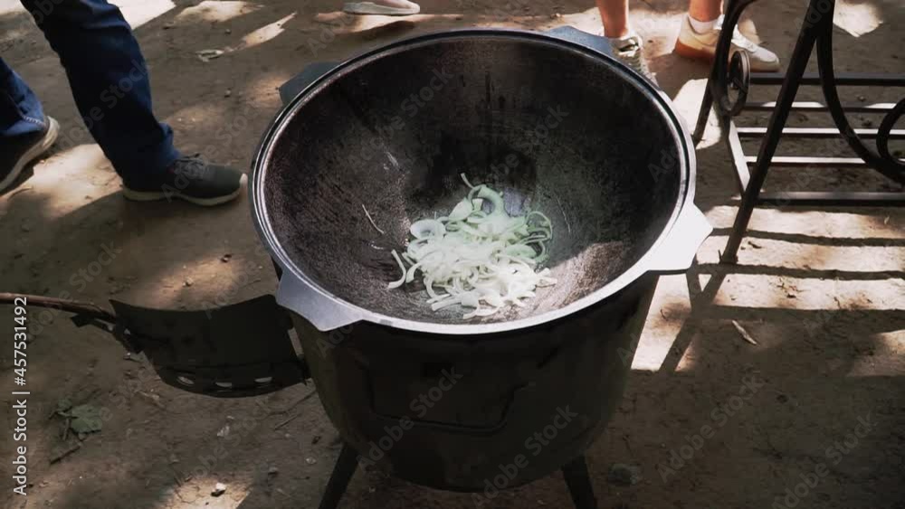 Cooking food in the open-air park. Summer barbecue on the weekend. Cooking food in the open-air park. Summer barbecue on the weekend.