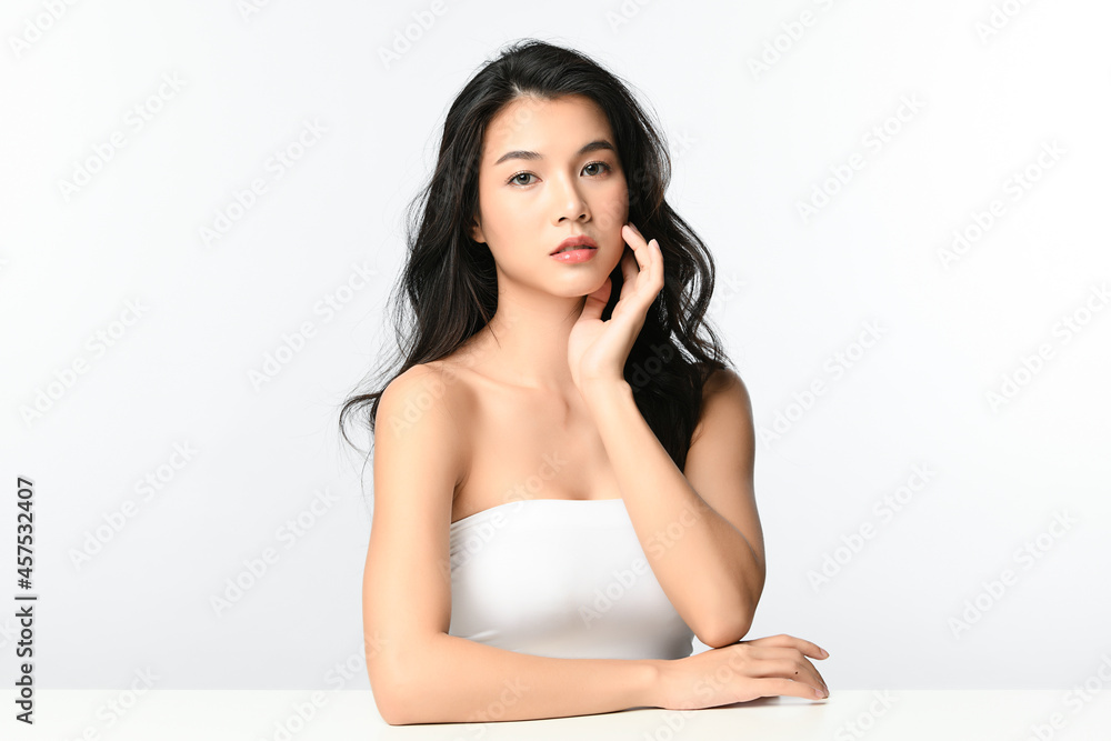 Beautiful young asian woman with clean fresh skin on white background, Face care, Facial treatment, Cosmetology, beauty and spa, Asian women portrait. Beautiful young asian woman with clean fresh skin on white background, Face care, Facial treatment, Cosmetology, beauty and spa, Asian women portrait.