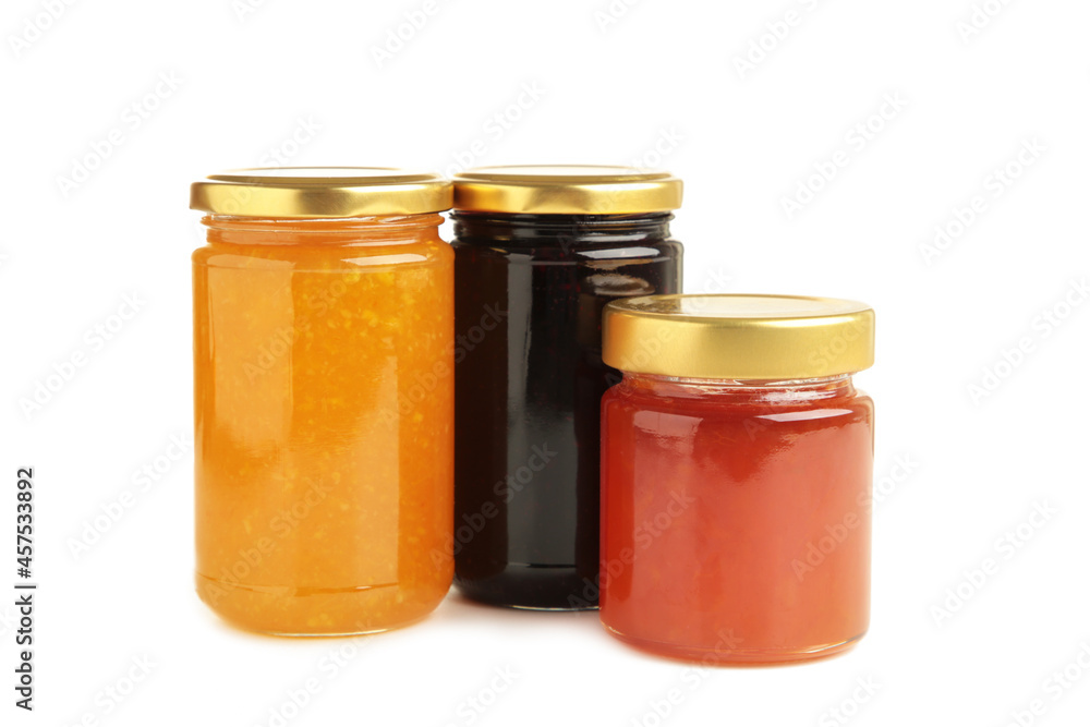 Assortment of jams, seasonal fresh berries and fruits isolated on white background. Assortment of jams, seasonal fresh berries and fruits isolated on white background.