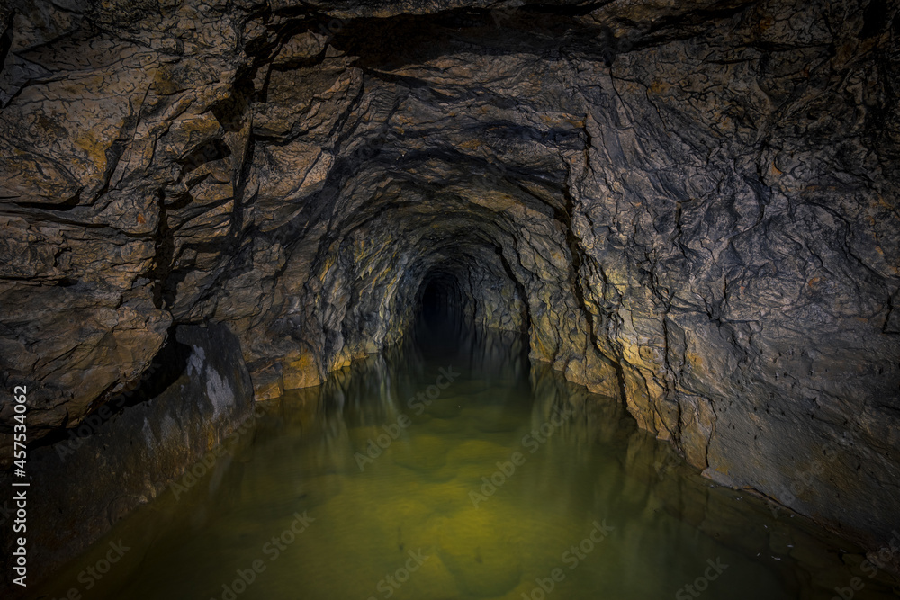 An old abandoned mining facility an ore mine adit system An old abandoned mining facility an ore mine adit system