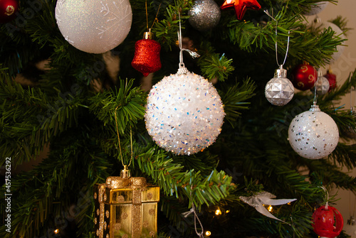christmas decor, toys, bows, glass balls, bokeh, background, toys, merry christmas, happy new year. 2022. Lights, sparkles and glare, snow. 