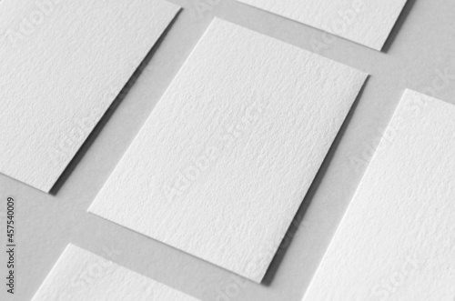 Textured business card mockup, vertical orientation. 55x85 mm. photo