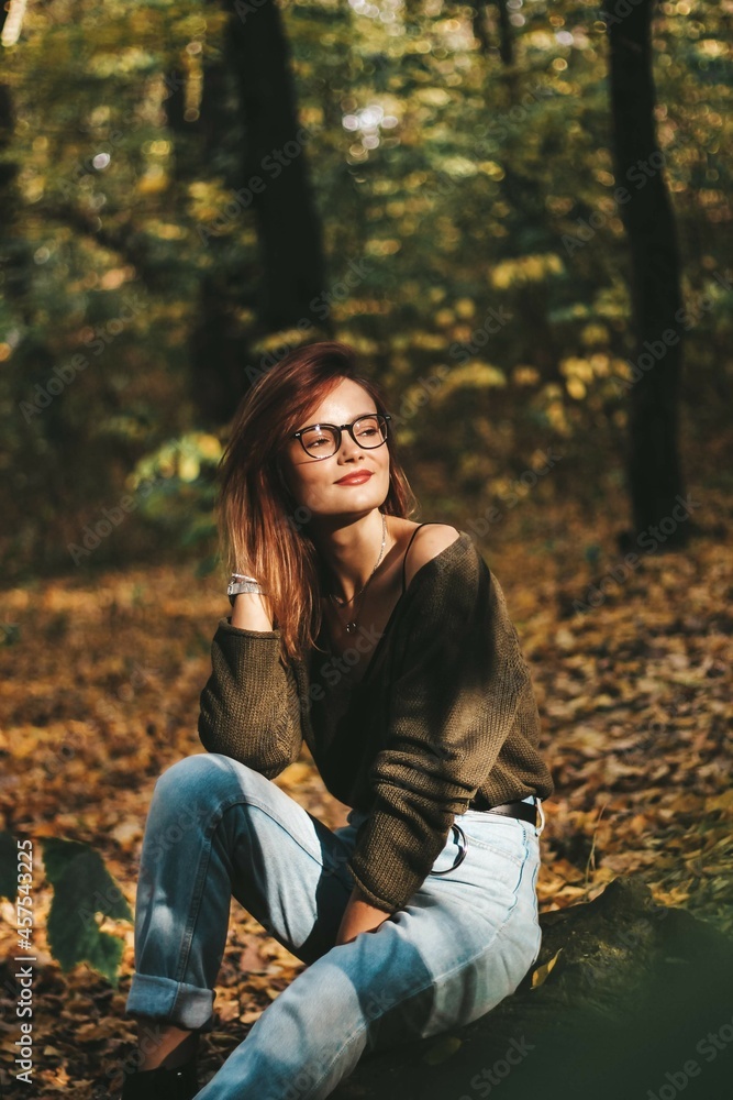 autumn photo session of a beautiful girl with dark hair in the forest. autumn photo session of a beautiful girl with dark hair in the forest.