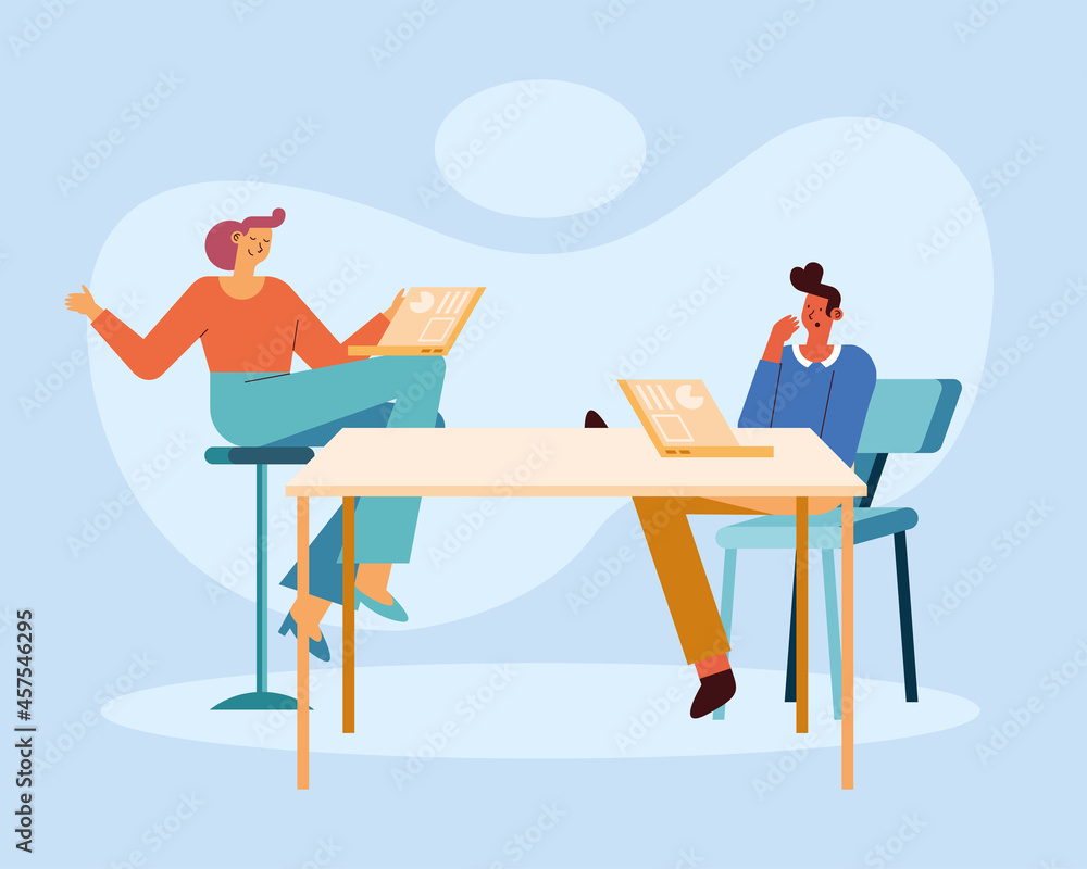 woman and man with laptops planning woman and man with laptops planning