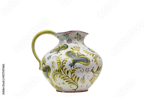 Earthenware jug with floral decor.